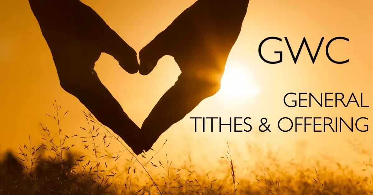 Hands forming a heart over a sunset, text reads 