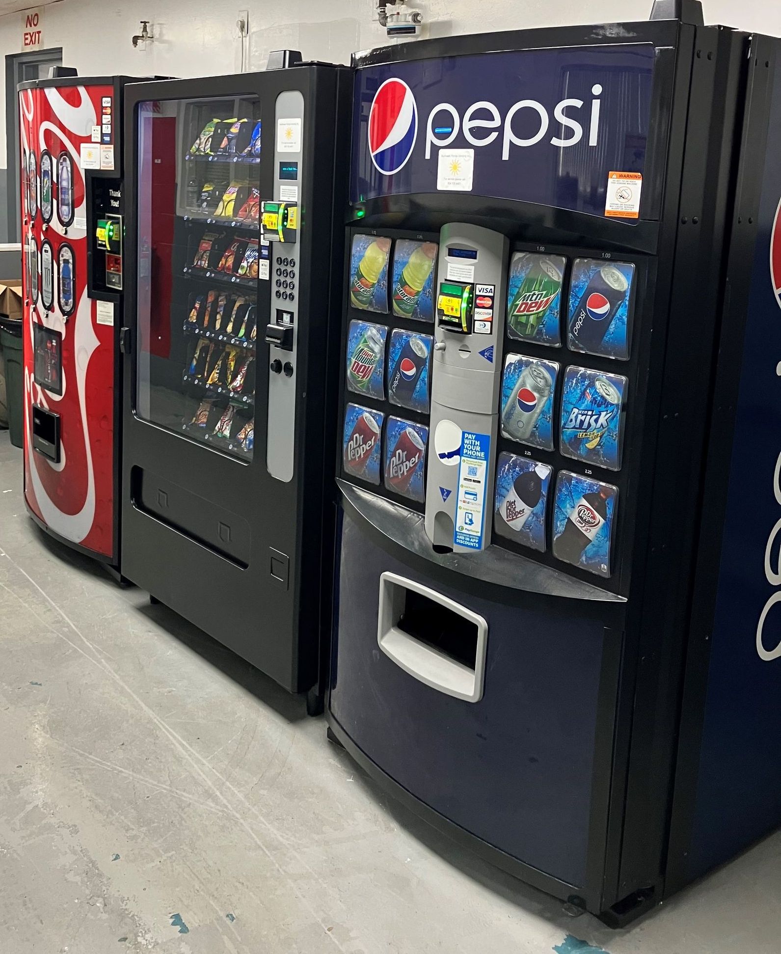 Getting Coffee at A Vending Machine — Orange Park, FL — Northeast Florida Vending Inc