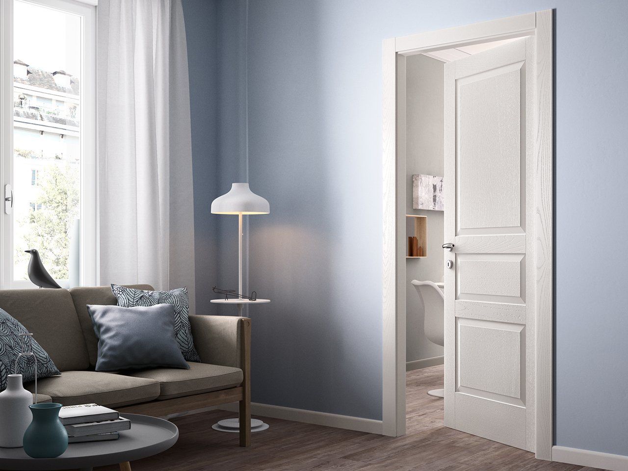 sala con porta in legno bianco