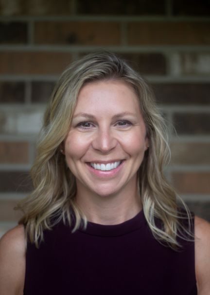 A professional headshot of Sara Taft, CEO of Upscale Assessment. Sara Taft leads with vision and expertise in the dental industry. Experience leadership excellence with Upscale Assessment's innovative solutions for dental hygiene assessment and practice management.