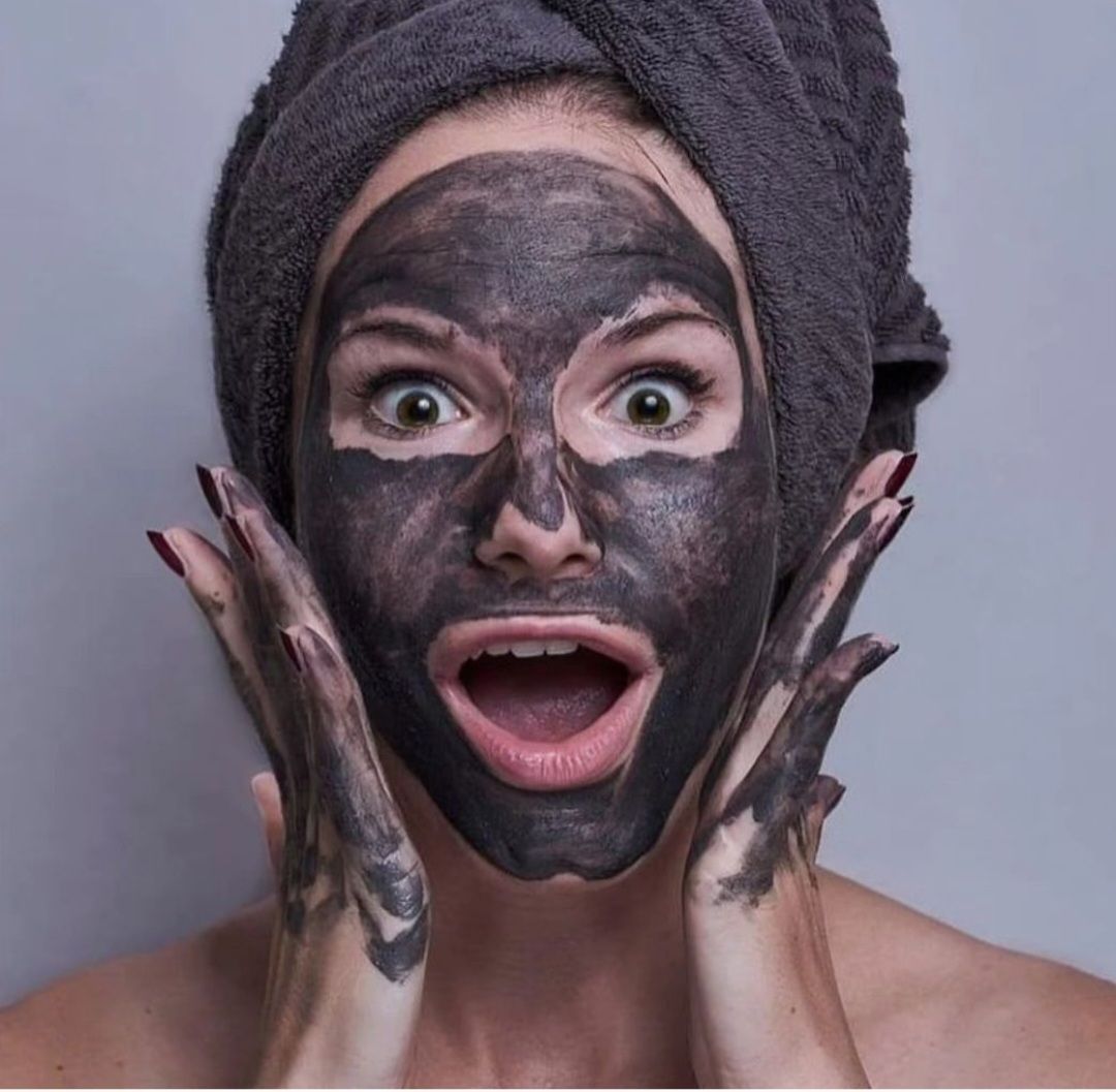 Woman Applying Cream On Face - Portland, VIC - The Beauty Boutique