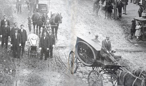 a black and white photo of a horse drawn carriage carrying a corpse .