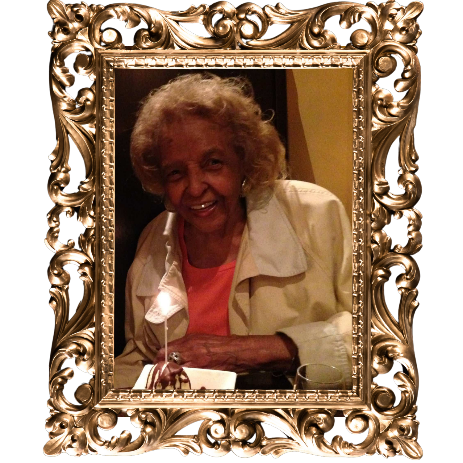 A picture of an elderly woman in a gold frame