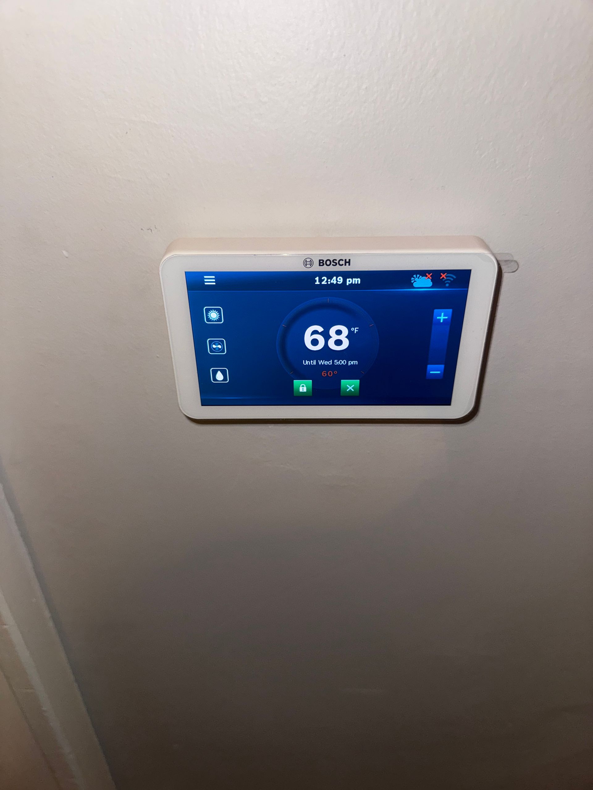 A thermostat shows the temperature is 72 degrees