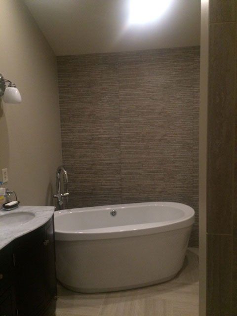 marbel vanity and tiled wall