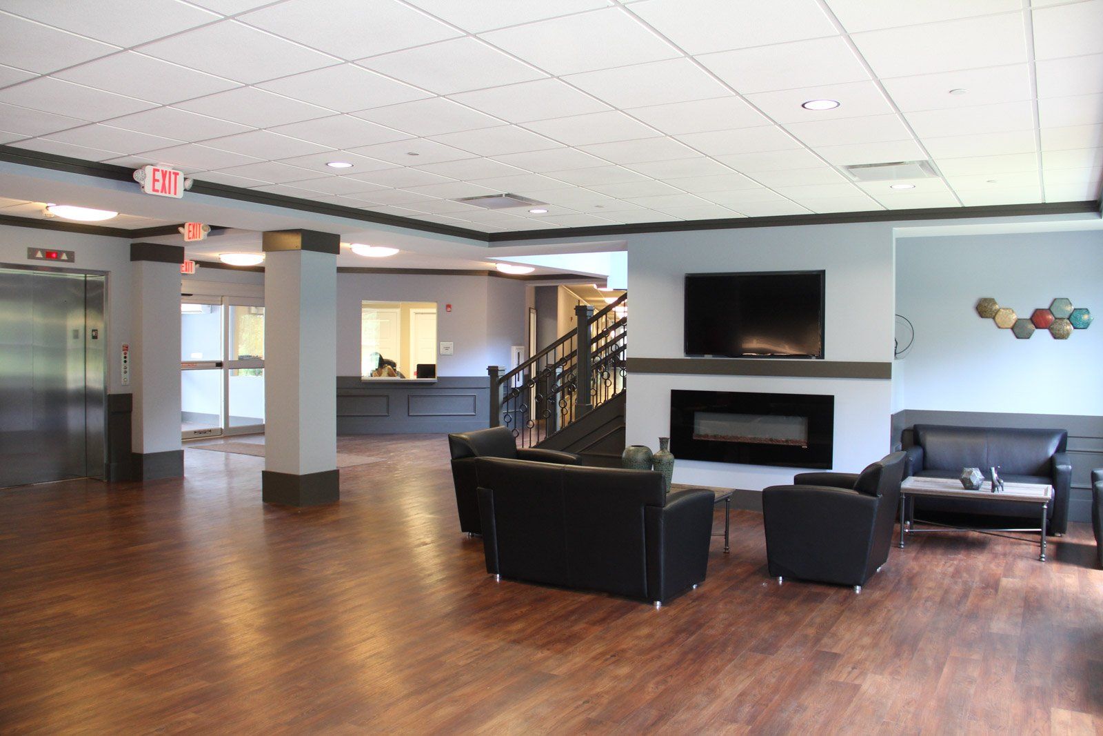 The Commons at Madaline Park community room with fire place