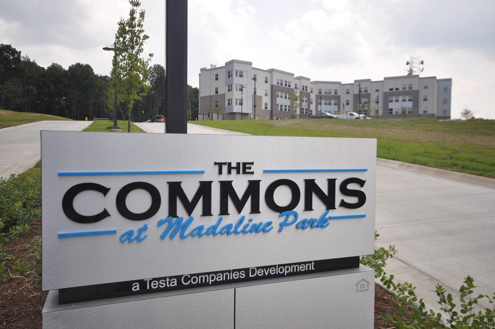 The Commons at Madaline Park signage and exterior