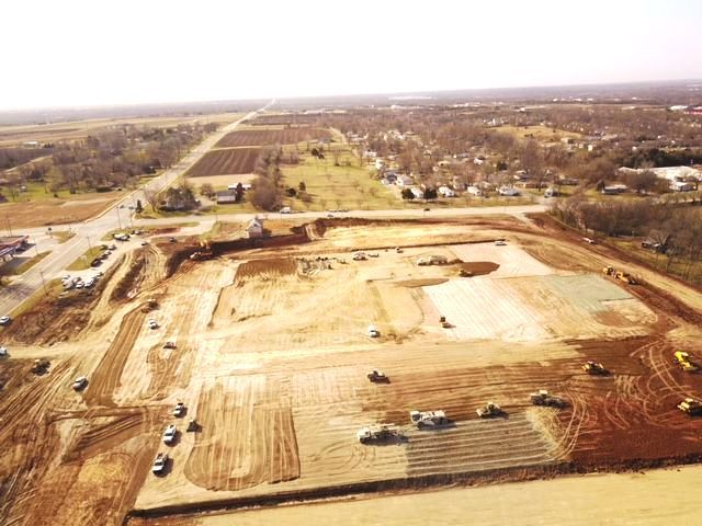 An aerial view of a construction site with a lot of dirt.