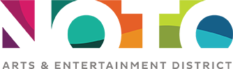 A colorful logo for the arts and entertainment district