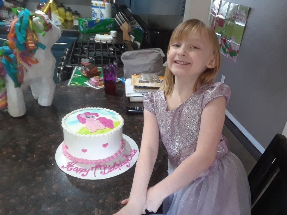 Child with rare conditions celebrating her birthday after receiving care