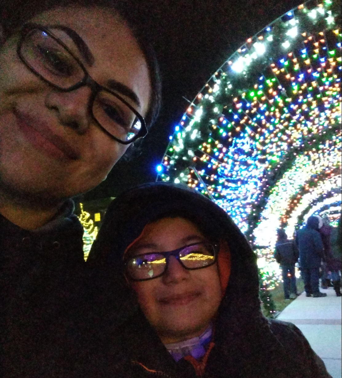 Child who needed surgery with mother at holiday light display