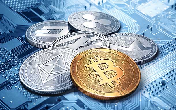 A bunch of coins are sitting on top of each other on a motherboard.