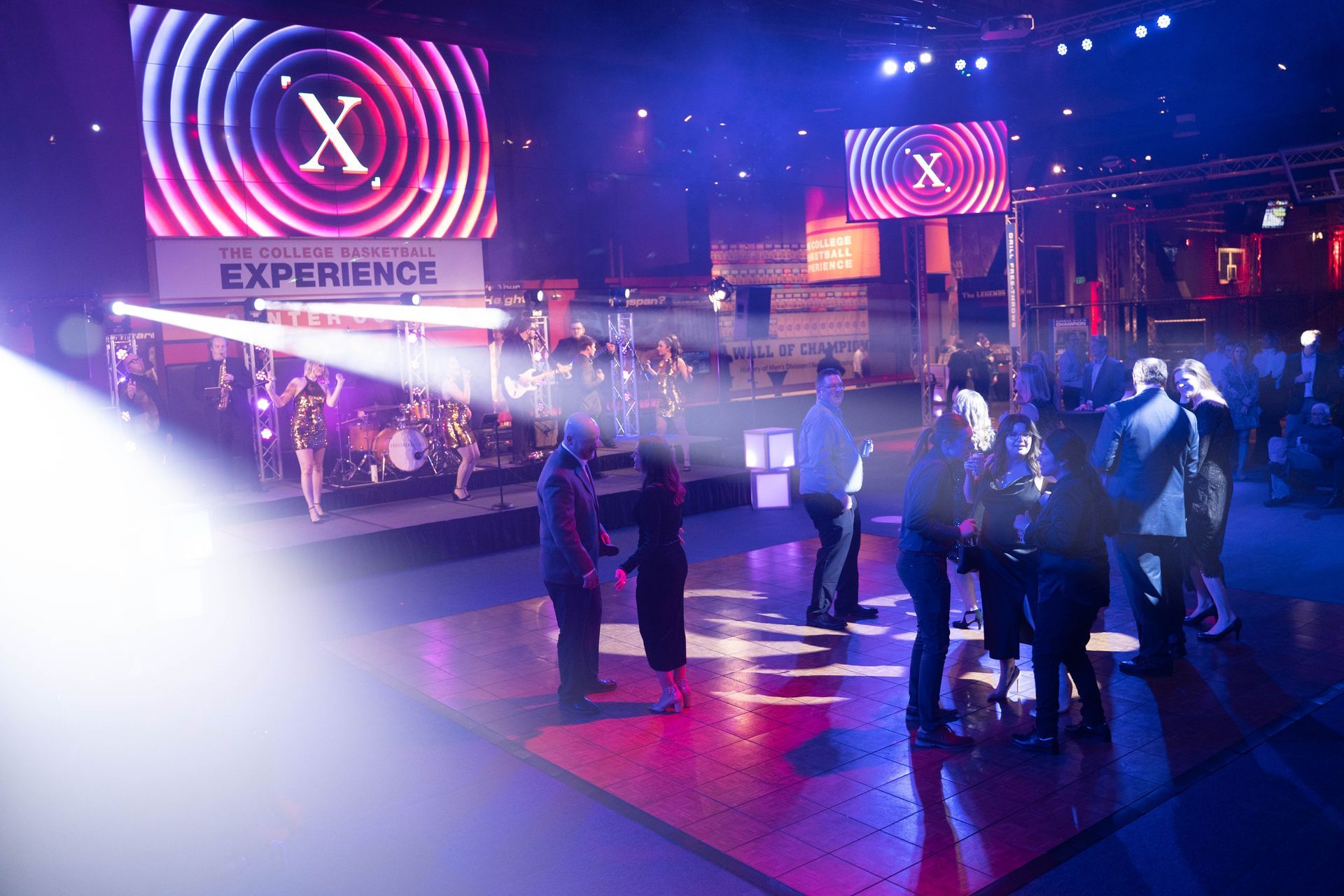 Few people are on the dance floor of the party