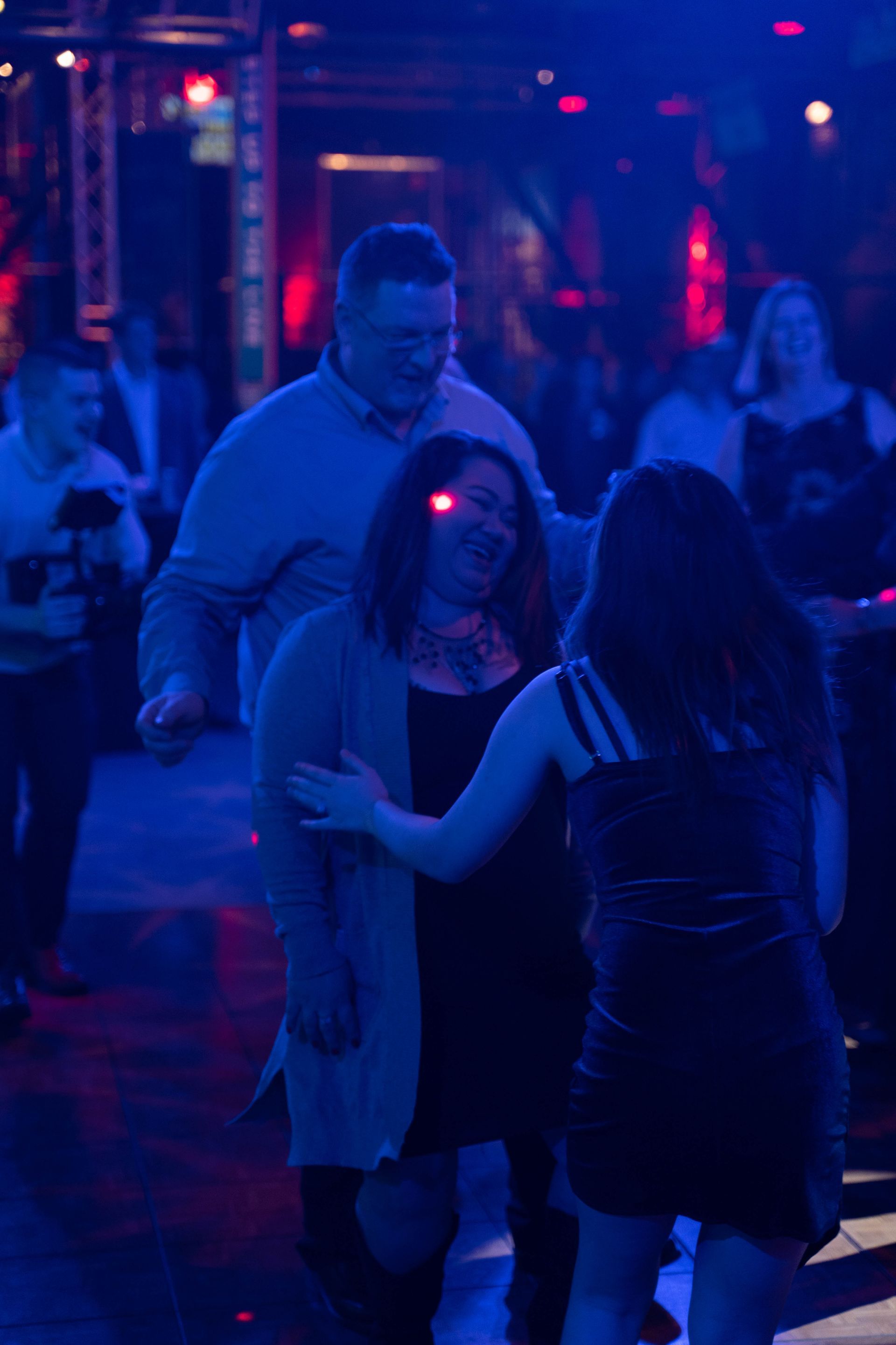 two women are talking and laughing