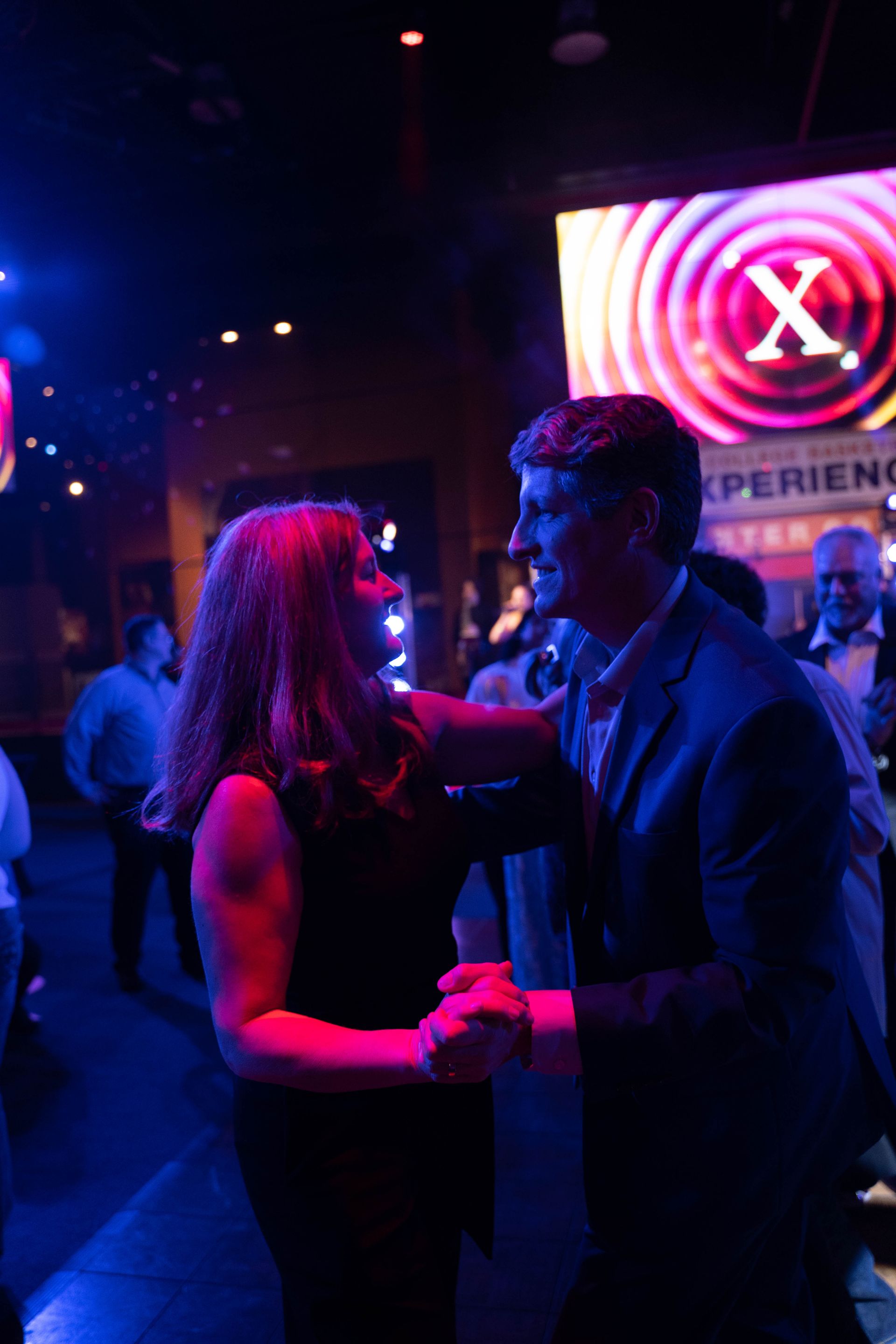 ICL's 100 year anniversary party with 2 people dancing on the dance floor