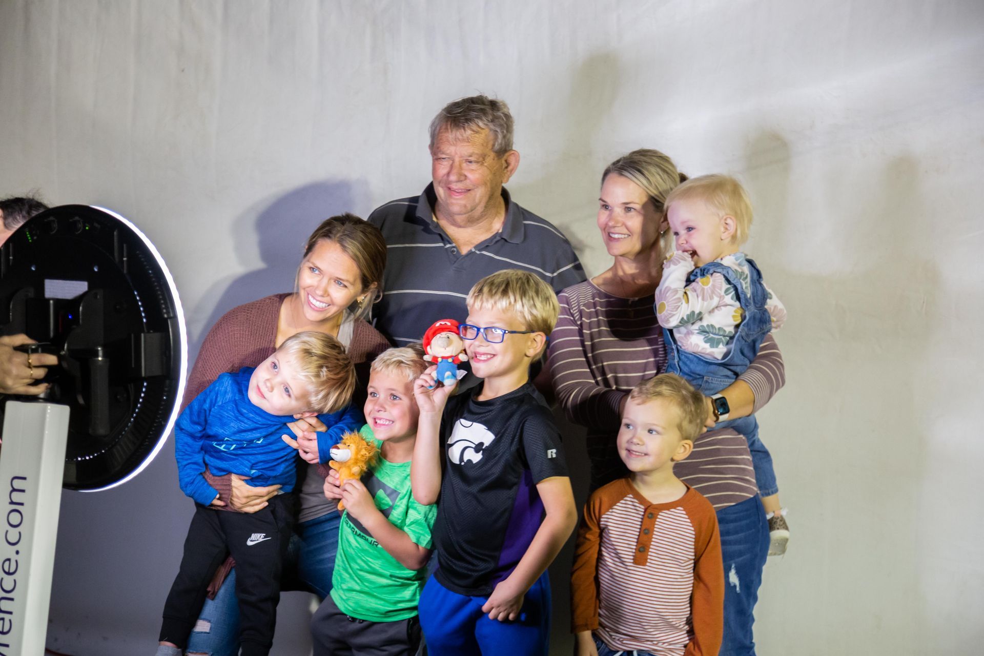 A family poses for the camera.