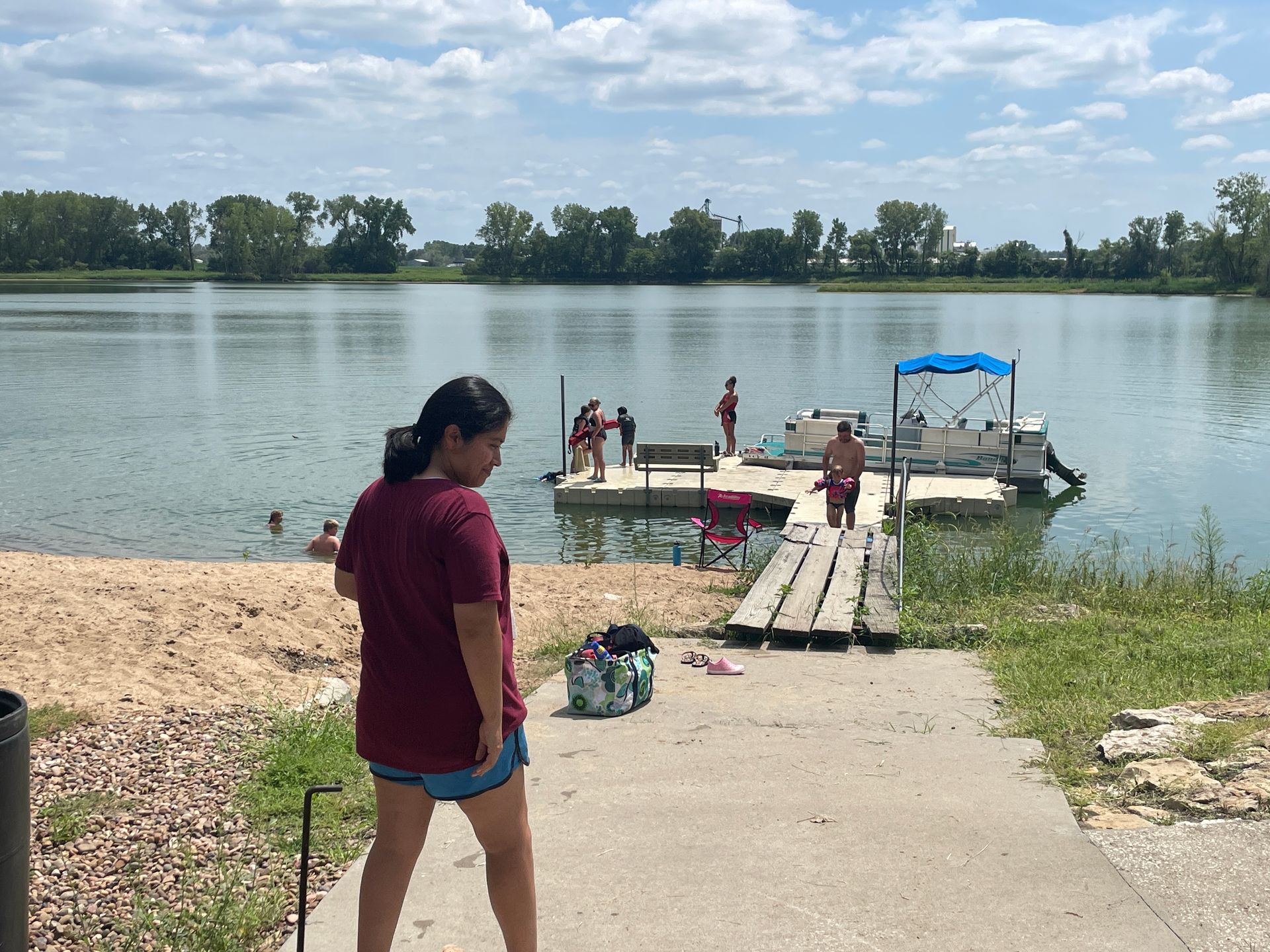 ICL summer picnic at a lake with a dock.
