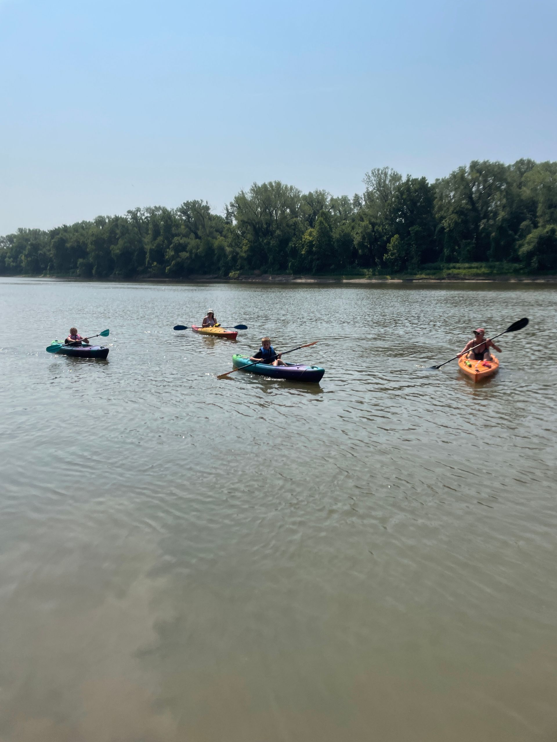 ICL employees are in their boats and floating down the river.