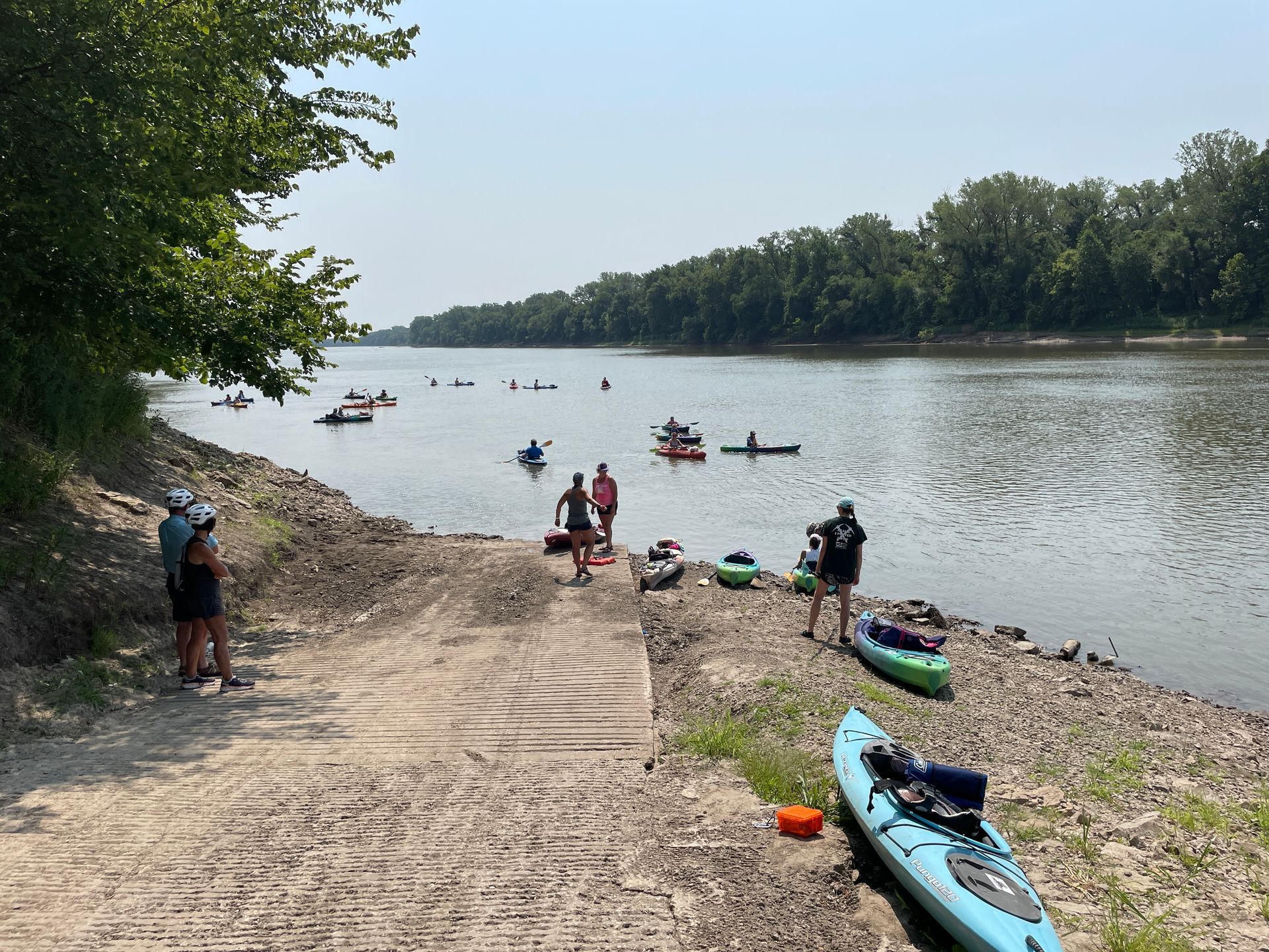 ICL employees are heading to the river to get in their boat to float down the river.
