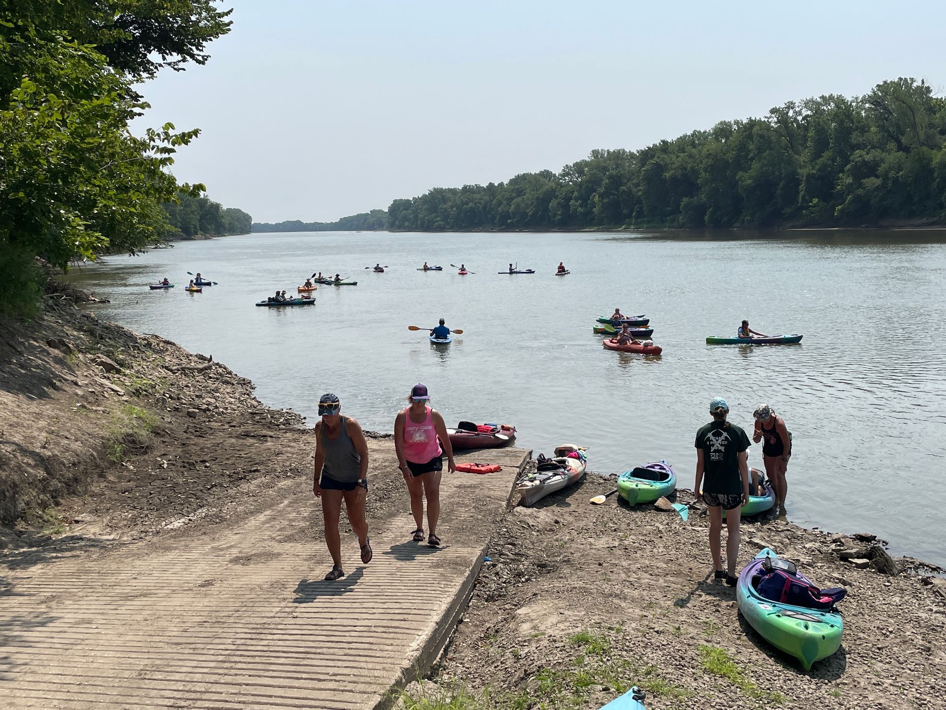 ICL employees are in their boats and floating down the river.