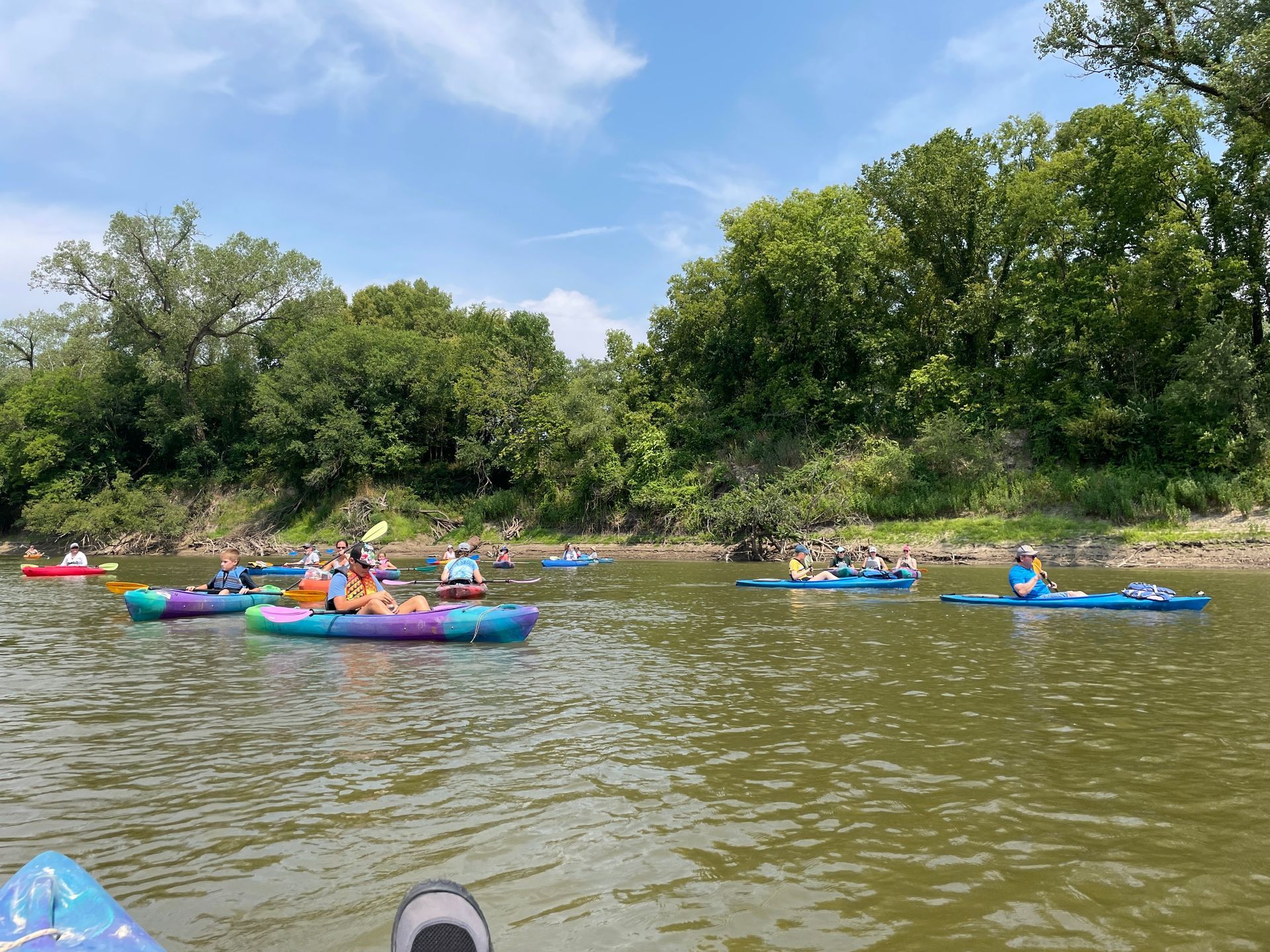 ICL employees are in their boats and floating down the river.