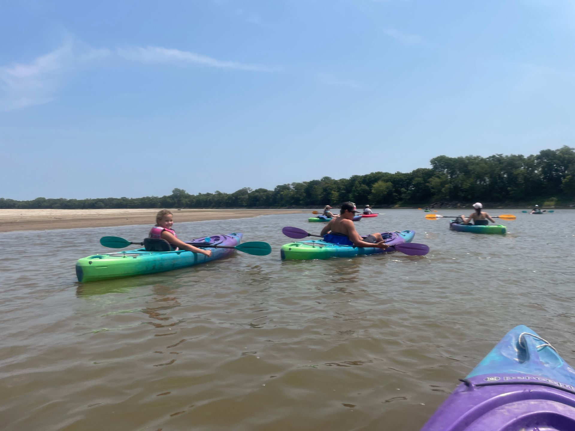 ICL employees are in their boats and floating down the river.