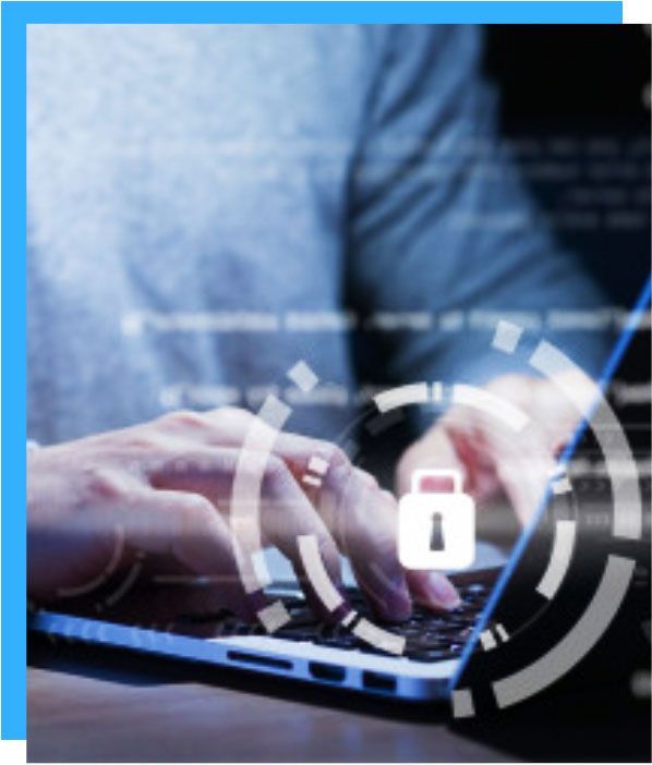 A person is typing on a laptop computer with a padlock icon on the screen.