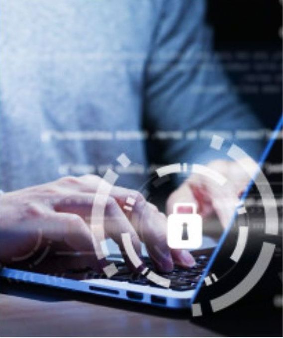 Person typing on a laptop with a security overlay, featuring a lock icon and digital rings.