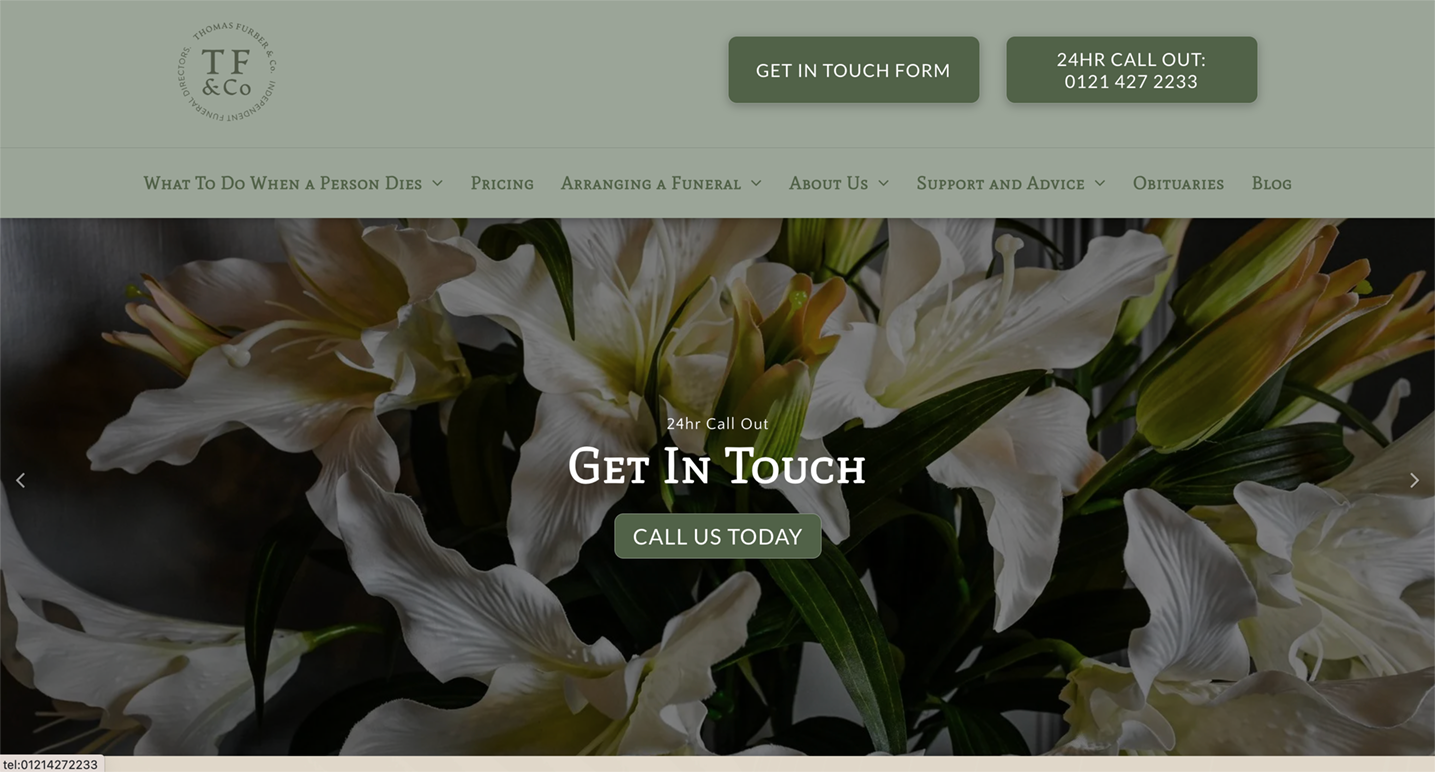 Website homepage with white lilies and