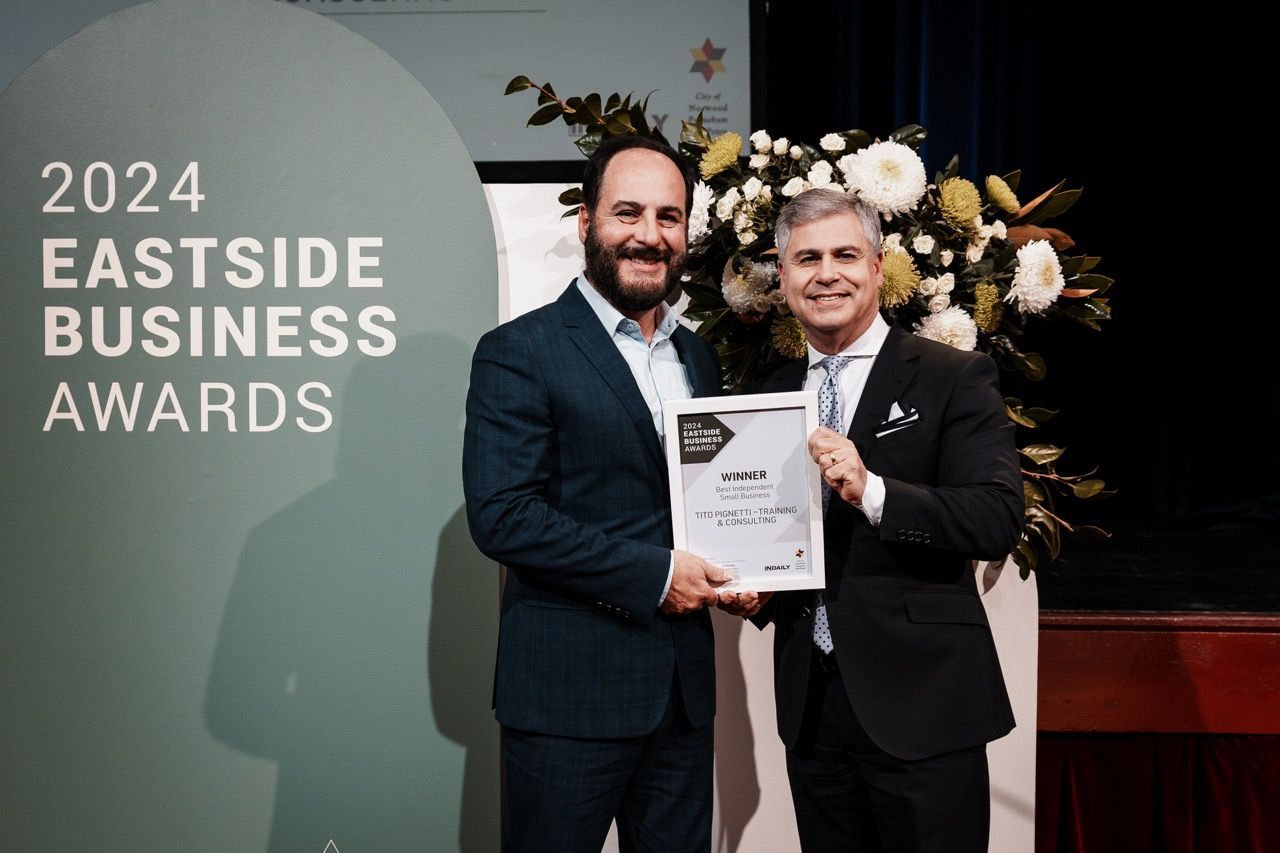 Tito Pignetti receiving award from Mayor, Robert Bria, for Eastside Business Awards 2024
