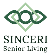 A logo for sinceri senior living with a green infinity symbol