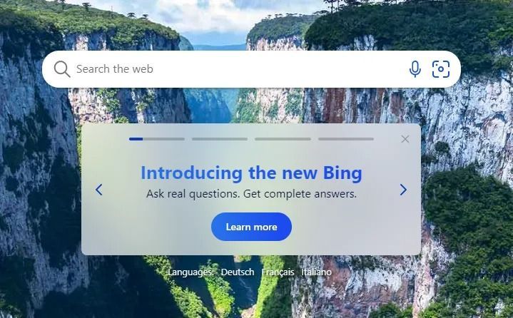 A screenshot of the new bing website with a mountain in the background.