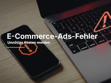 Ein Laptop und ein Handy liegen auf einem Tisch, wobai auf beiden Geräten ein Warnsignal erscheint.