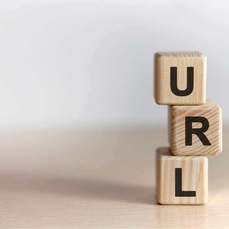 Wooden blocks with the letters url stacked on top of each other