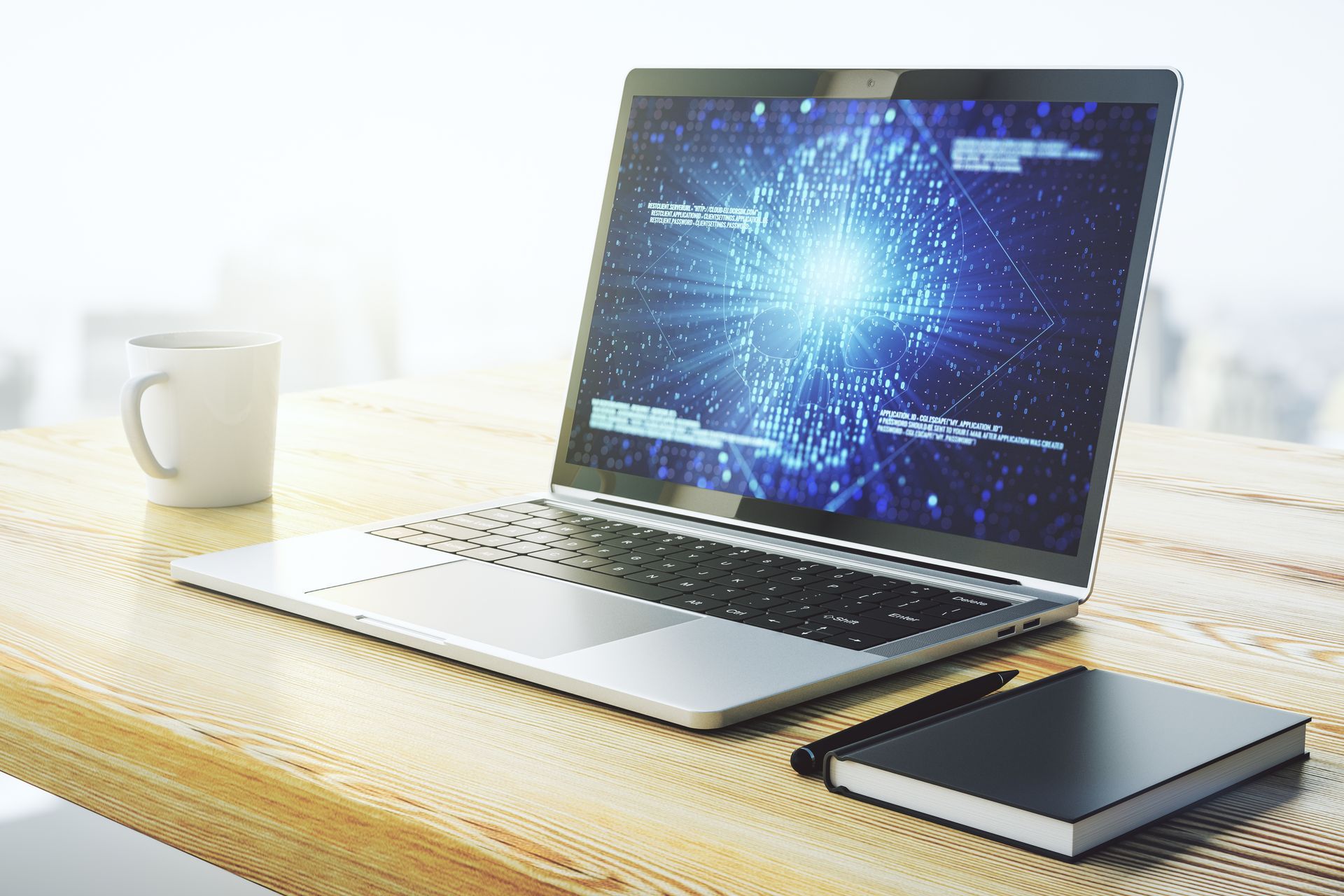 Laptop mit leuchtend blauem Digitaldisplay, Kaffeetasse und Notizbuch auf einem Holztisch.