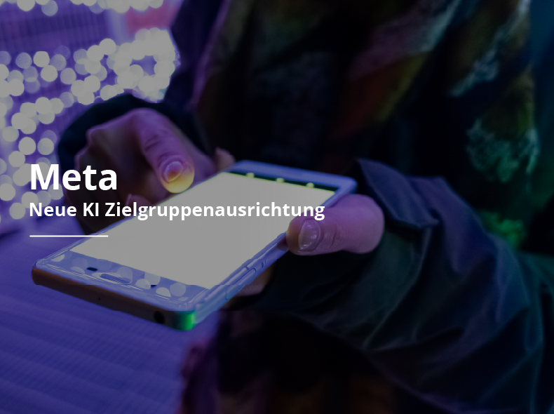 Eine Person hält ein Handy mit dem Wort „meta“ in der Hand