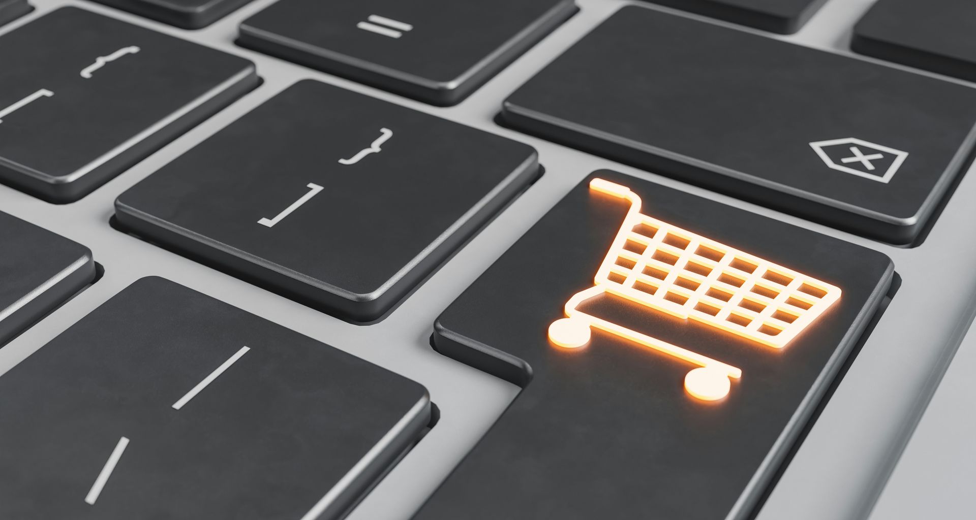 Eine Tastatur mit einem Einkaufswagen als Enter-Taste