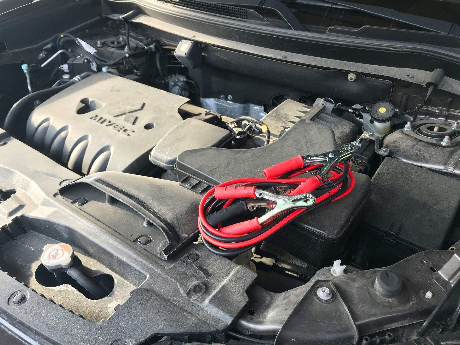 Car Engine With Jumper Cables Attached | Absolute Automotive