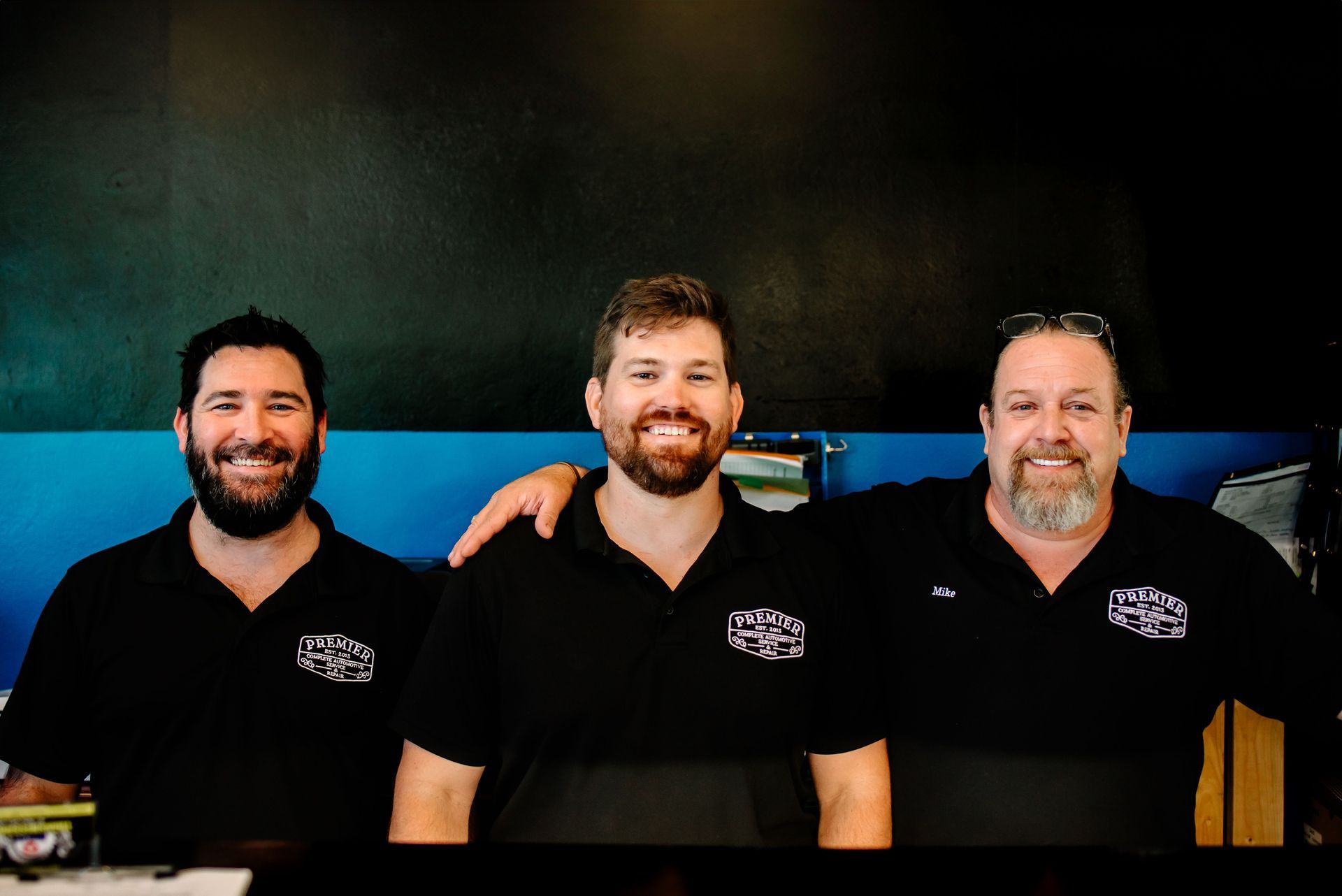 A room with a counter and a ceiling fan in it