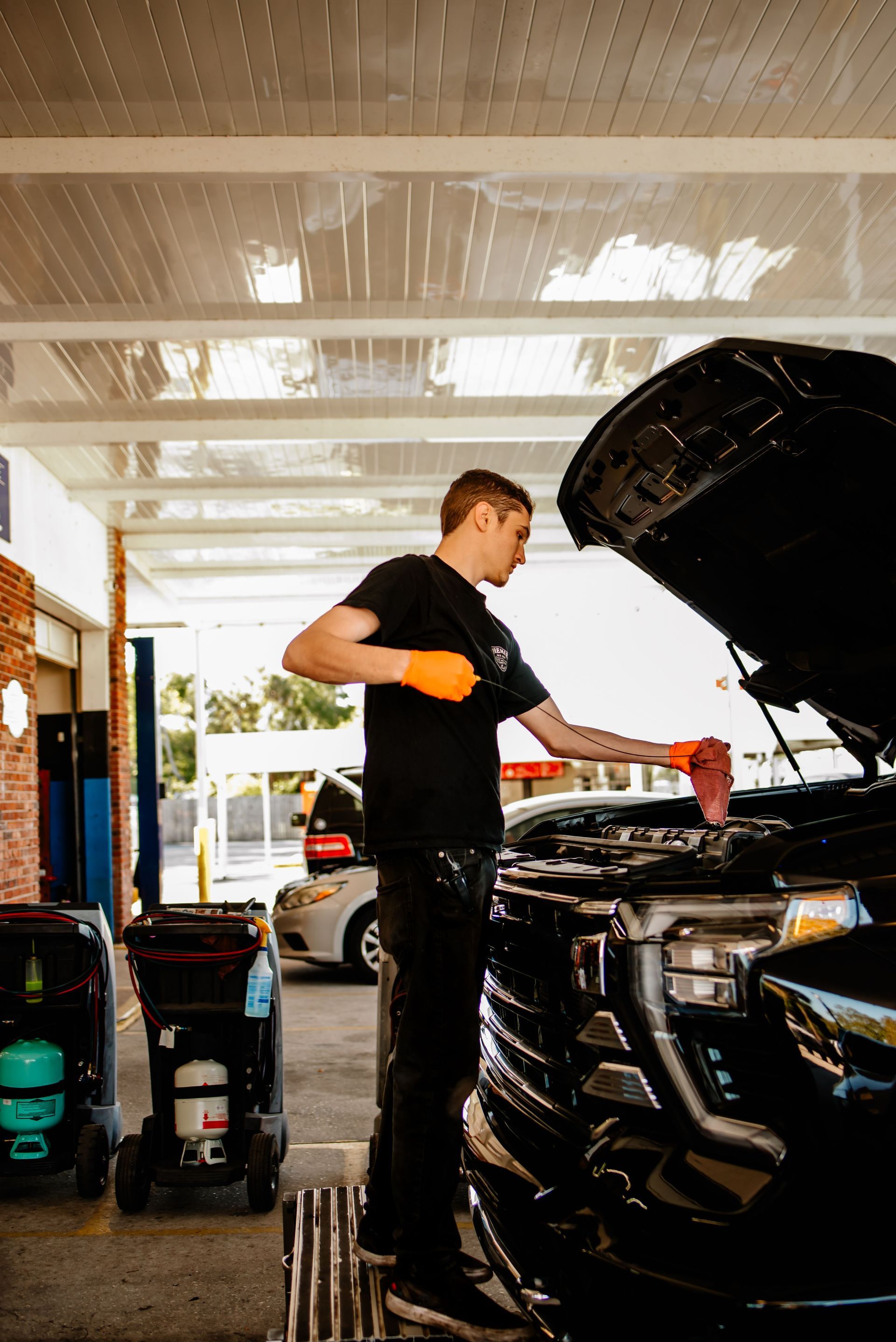 A group of people are posing for a picture in front of a building.