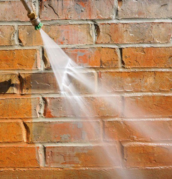 Power Washing a Brick Home — FNQ Pressure Cleaning  in Atherton, QLD