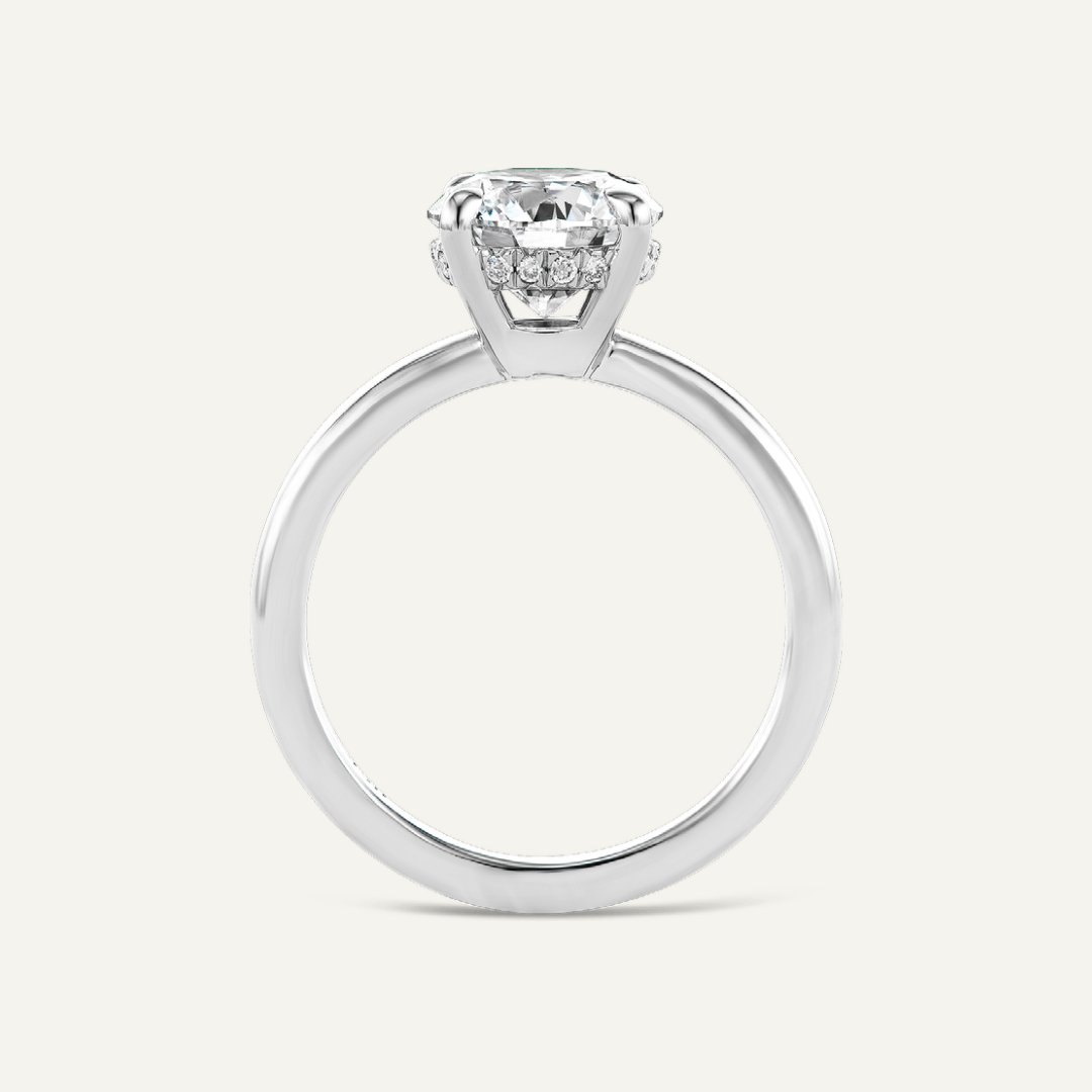 Platinum pave set under-bezel, 2.51ct round diamond center