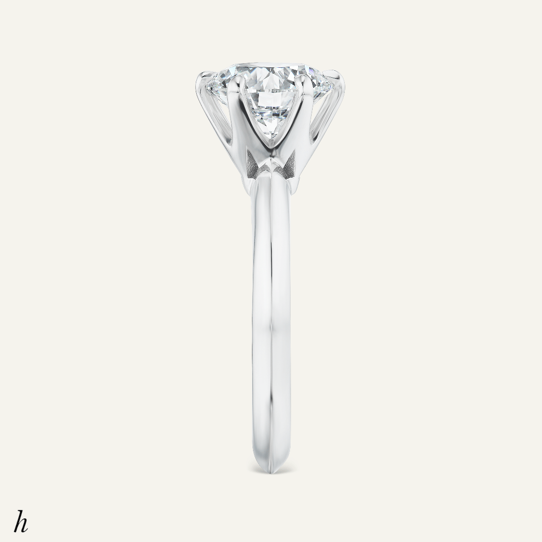 2.24ct Round Diamond solitaire, classic six prong ridge line design