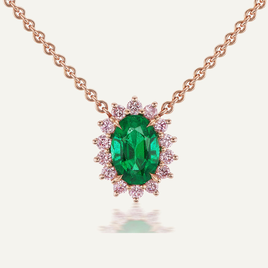 2.04ct oval Emerald, pink diamond sides in rose gold