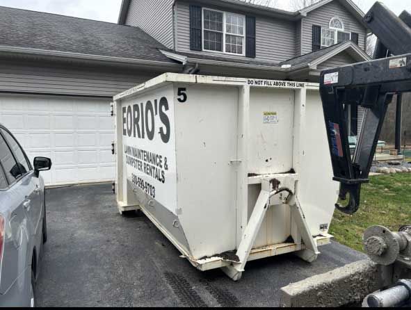 A large white container with black text on it — Youngstown, OH — Eorio's Dumpster Rentals