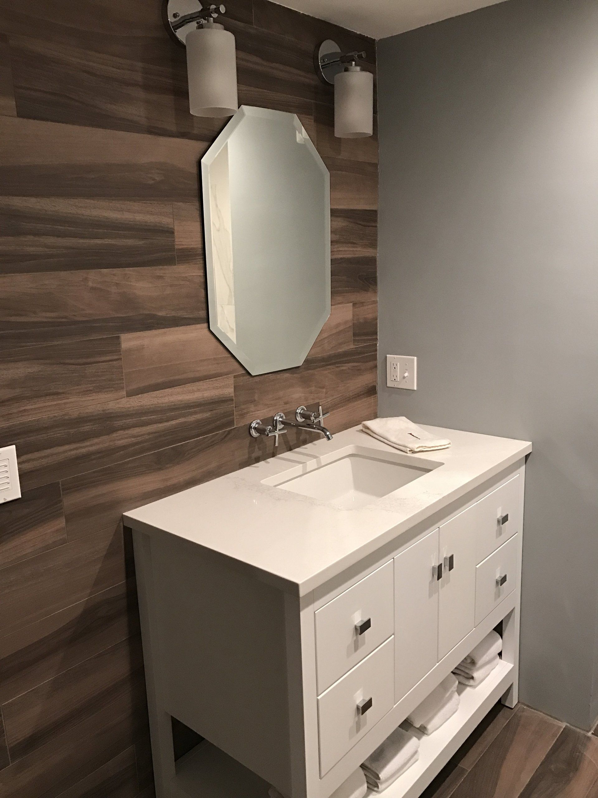 Bertch Vanity with a hardwood tile accent wall