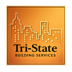 Gold-toned logo: City skyline outline above