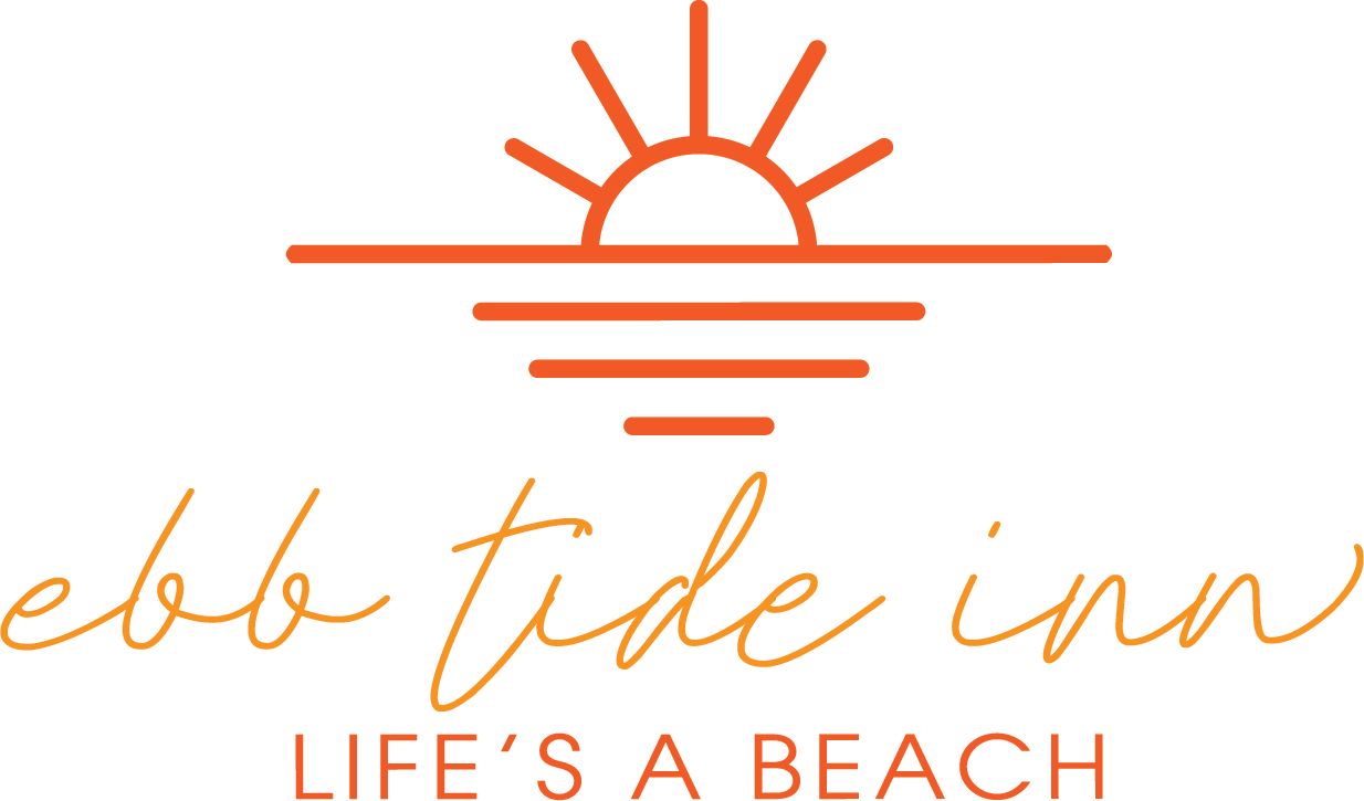 A logo for a beach resort with a sunset and the words `` life 's a beach ''.