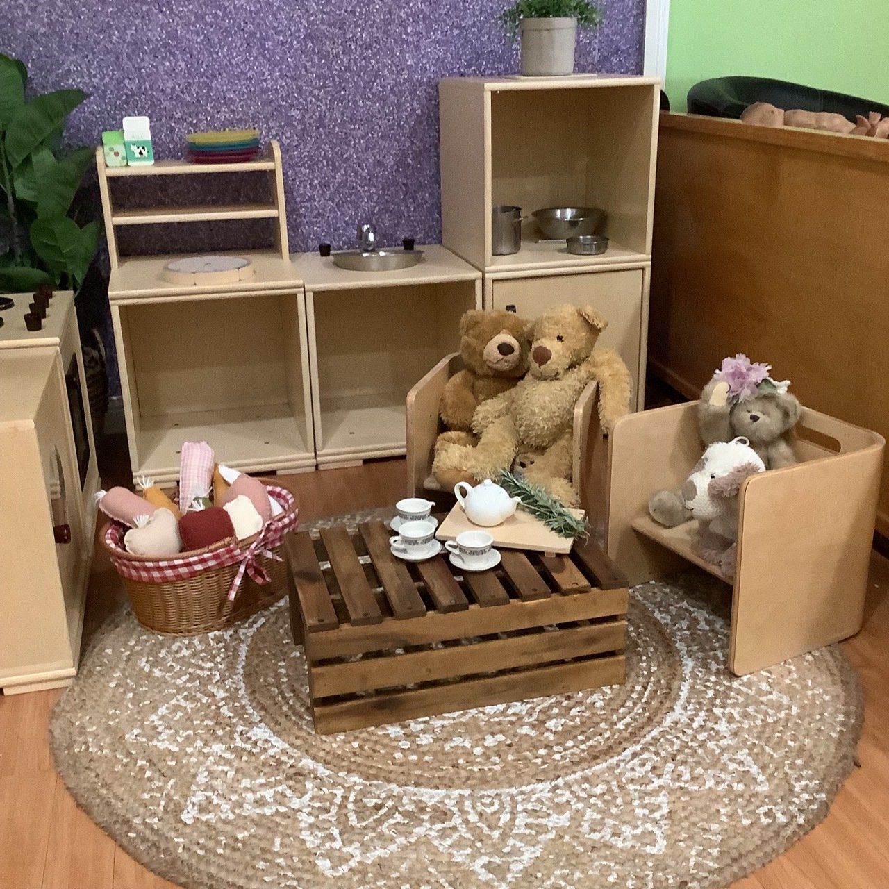 Two Teddy Bears Are Sitting On A Chair In A Play Room — Juniors At Wamberal in Wamberal, NSW