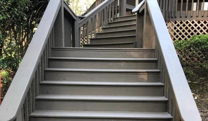 A set of stairs leading up to a house.